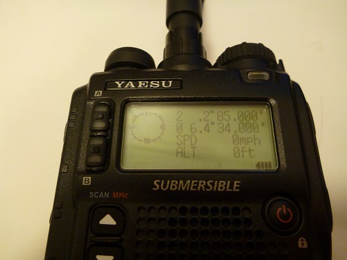 Photo of Yaesu VX-8DR radio transceiver showing garbage data after receiving improper GPS NMEA sentence
